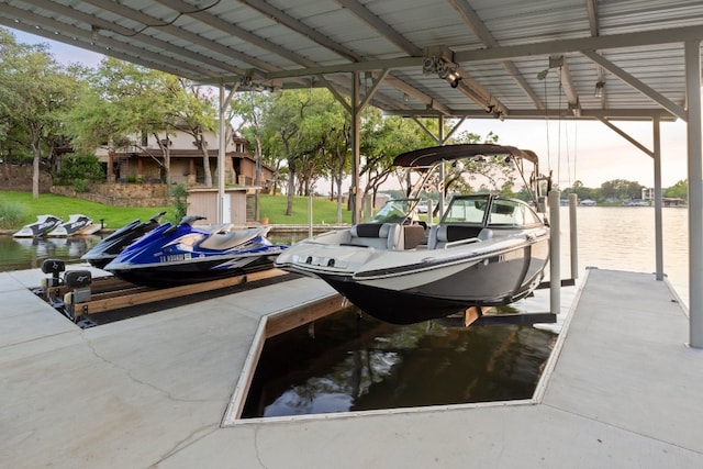 dock area featuring a water view