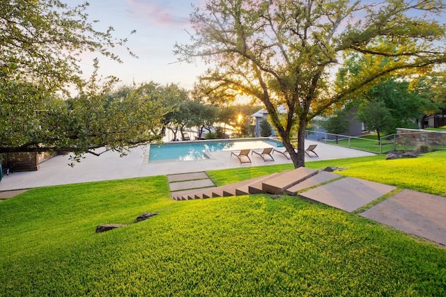 exterior space featuring a patio and a yard