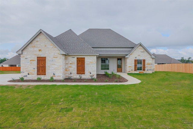 view of front of home with a front lawn