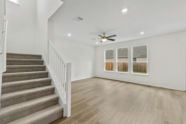 interior space featuring ceiling fan and wood-type flooring