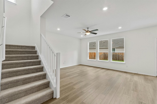 1721 Tin Can Trl, Georgetown, TX 78628 - staircase featuring ceiling fan, wood finished floors, recessed lighting, and baseboards