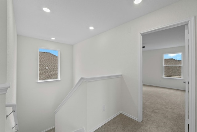 1721 Tin Can Trl, Georgetown, TX 78628 - hall with carpet flooring, plenty of natural light, recessed lighting, and baseboards