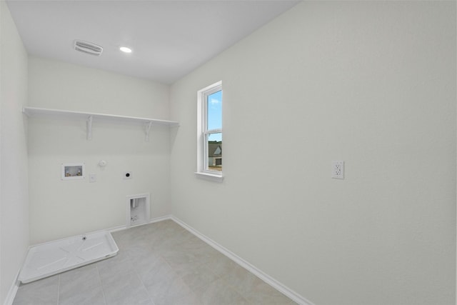 1721 Tin Can Trl, Georgetown, TX 78628 - laundry area with gas dryer hookup, hookup for an electric dryer, hookup for a washing machine, and baseboards