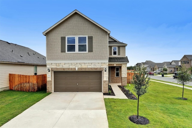 view of front of property featuring a garage and a front lawn