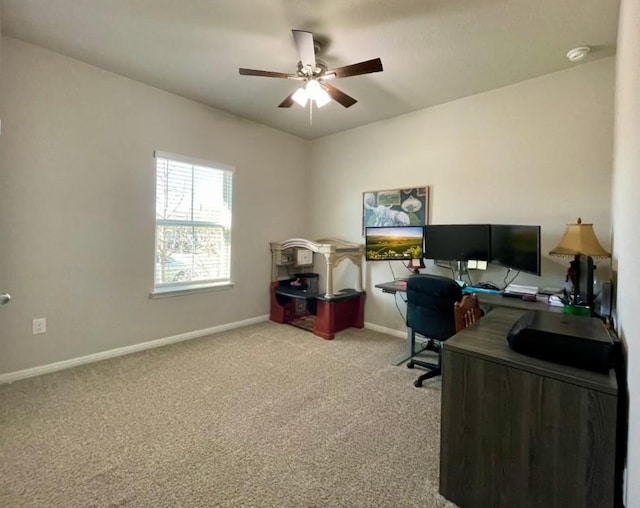 home office featuring baseboards, carpet floors, and ceiling fan