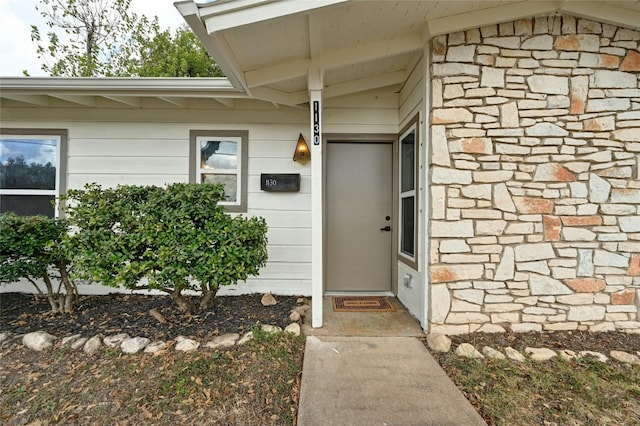 1130 Gardner Rd, Austin, TX 78721 - entrance to property featuring stone siding
