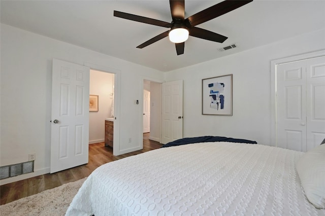 1130 Gardner Rd, Austin, TX 78721 - bedroom featuring wood finished floors and a ceiling fan