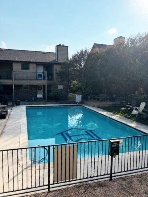 5608 Cougar Dr Unit 219, Austin, TX 78745 - community pool with fence and a patio area