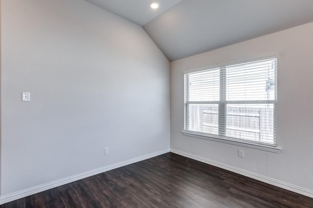 509 Oleander Loop, Buda, TX 78610 - empty room with baseboards, dark wood-style floors, and lofted ceiling