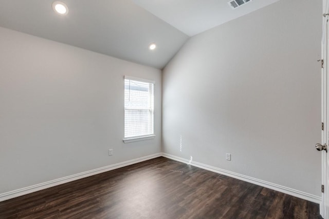 509 Oleander Loop, Buda, TX 78610 - empty room with recessed lighting, dark wood-style flooring, vaulted ceiling, and baseboards