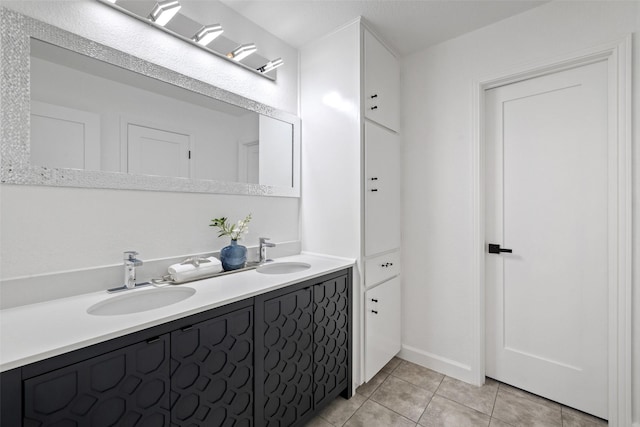 bathroom featuring tile patterned floors and vanity