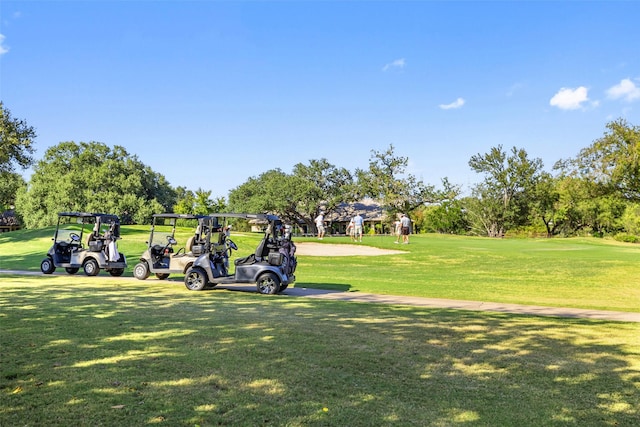 surrounding community featuring a lawn