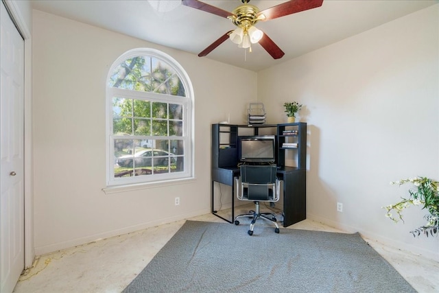 office space with ceiling fan