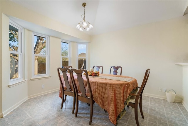 dining area with a chandelier