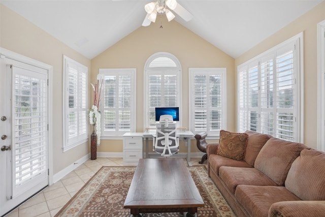 living room with light tile patterned floors, vaulted ceiling, and ceiling fan