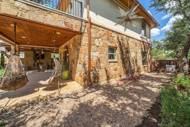 exterior space with a patio and ceiling fan