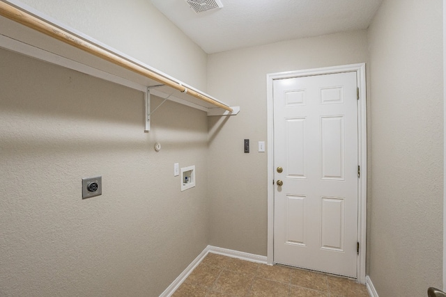 laundry area featuring tile patterned floors, electric dryer hookup, and hookup for a washing machine