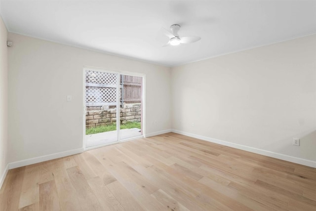 spare room with ceiling fan and light hardwood / wood-style flooring