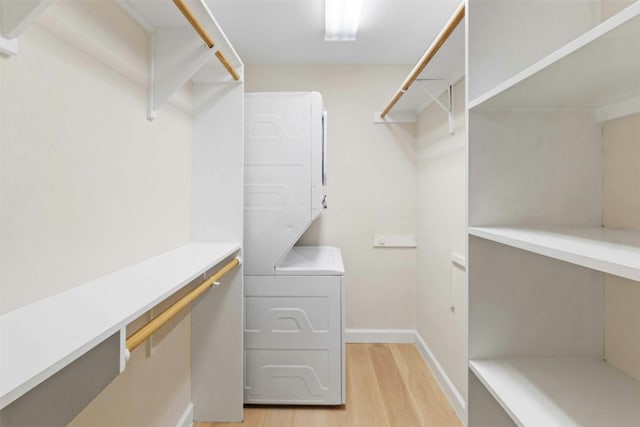 walk in closet featuring light hardwood / wood-style flooring