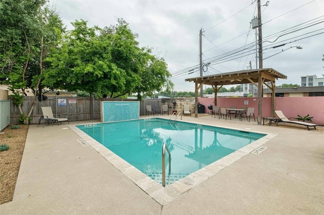 view of pool featuring a patio