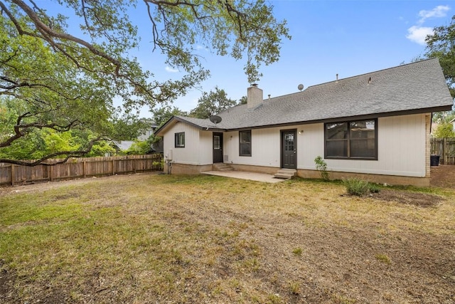 6700 Colina Ln, Austin, TX 78759 - back of property with a fenced backyard, a chimney, a patio, and a shingled roof