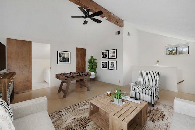 living room with high vaulted ceiling, ceiling fan, and beamed ceiling