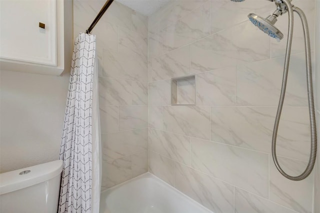 6700 Colina Ln, Austin, TX 78759 - bathroom featuring shower / tub combo and toilet