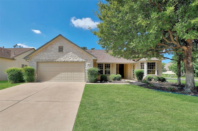 ranch-style house featuring a garage and a front lawn