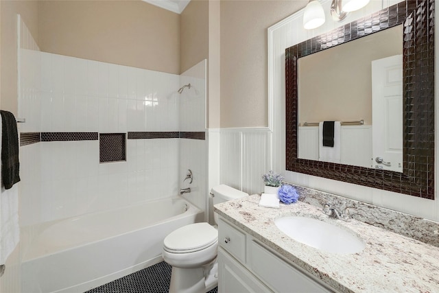 full bathroom with tile patterned floors, vanity, toilet, and tiled shower / bath