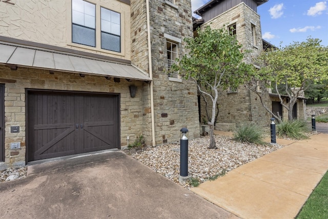 exterior space with a garage