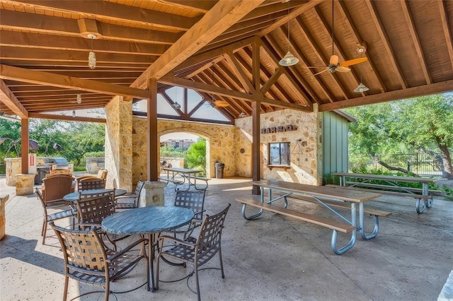 view of patio / terrace with area for grilling and ceiling fan