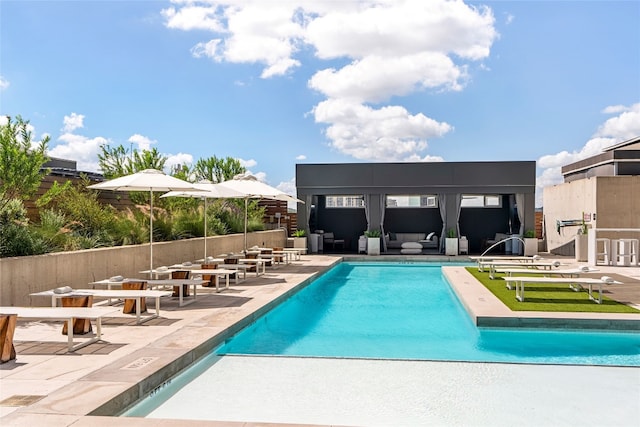 view of pool featuring a patio area