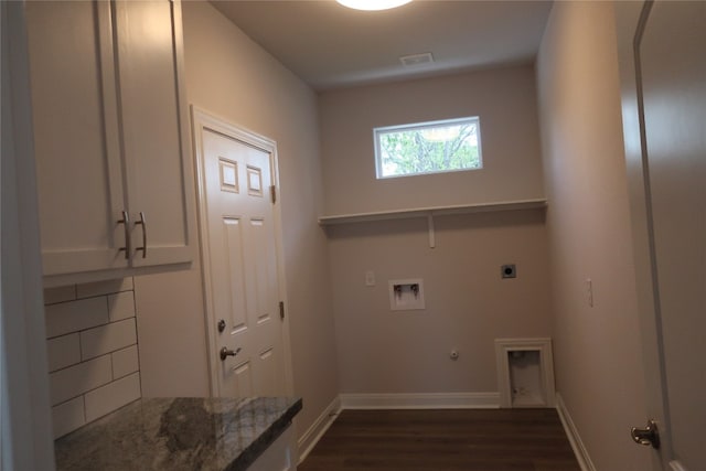 laundry area with washer hookup, gas dryer hookup, dark wood-type flooring, and hookup for an electric dryer