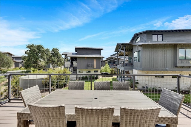 wooden deck with a patio