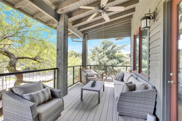 deck featuring ceiling fan and an outdoor hangout area