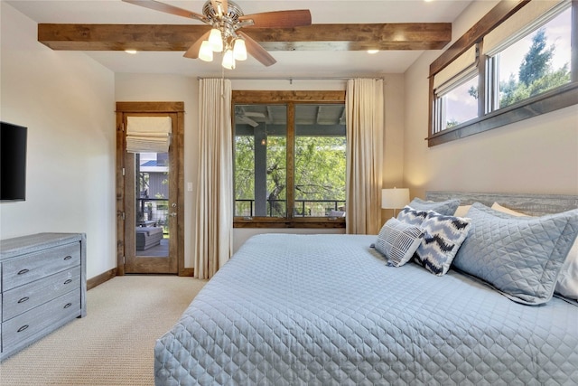 carpeted bedroom with multiple windows, access to outside, beam ceiling, and ceiling fan