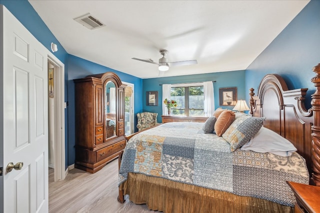 bedroom featuring ceiling fan and light hardwood / wood-style floors