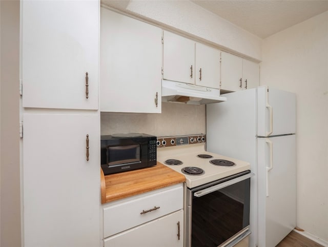 kitchen featuring white cabinets and white electric stove