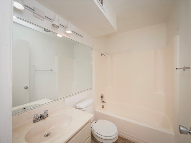 full bathroom with bathing tub / shower combination, vanity, and toilet