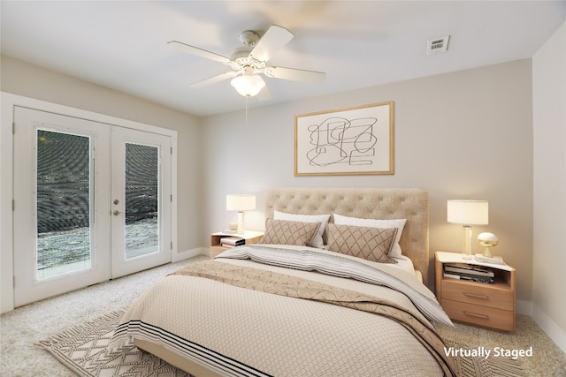 carpeted bedroom featuring access to exterior, ceiling fan, and french doors