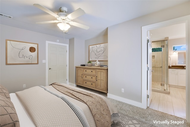 bedroom featuring connected bathroom and ceiling fan