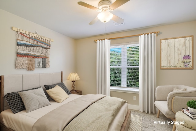 carpeted bedroom featuring ceiling fan