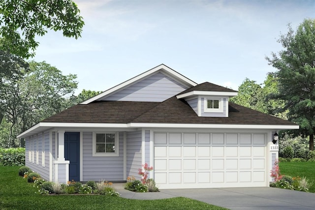 view of front of home featuring a front lawn and a garage