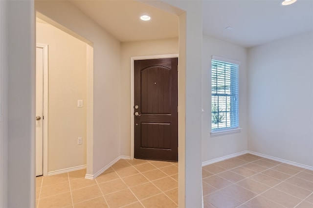 foyer with light tile patterned floors