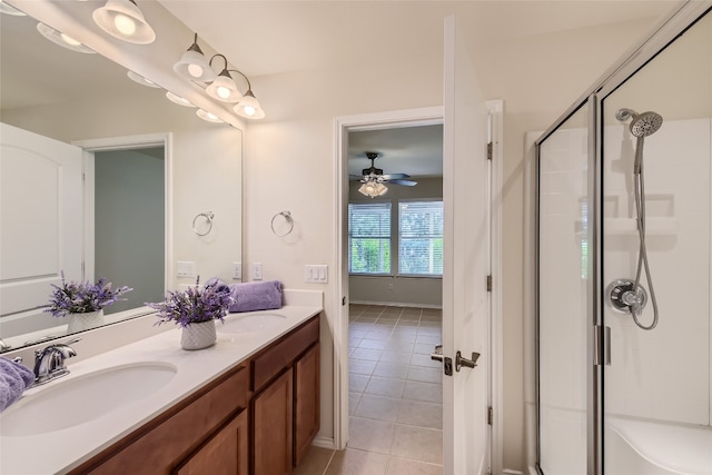 bathroom featuring vanity, tile patterned floors, ceiling fan, and an enclosed shower