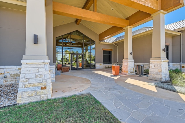 doorway to property featuring a patio area