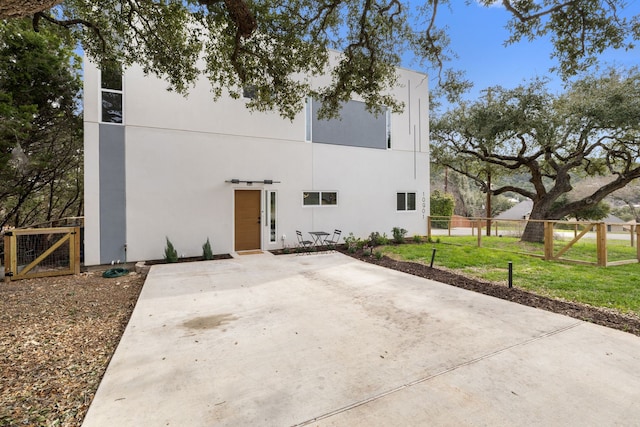 exterior space with a yard and a patio