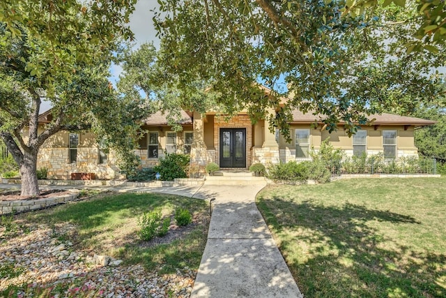 view of front of home with a front lawn