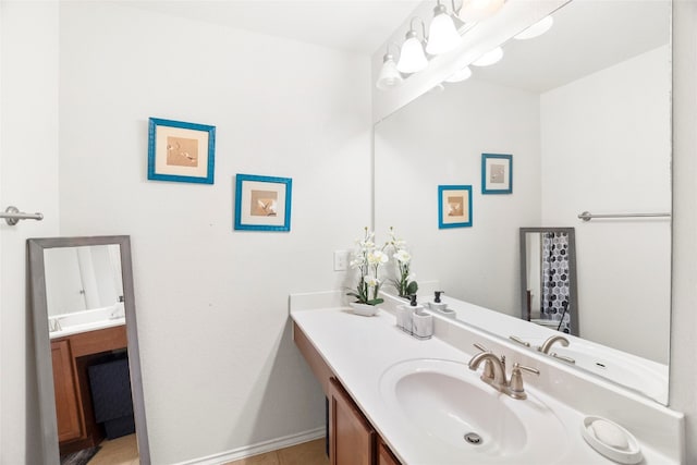 bathroom with vanity and tile patterned floors