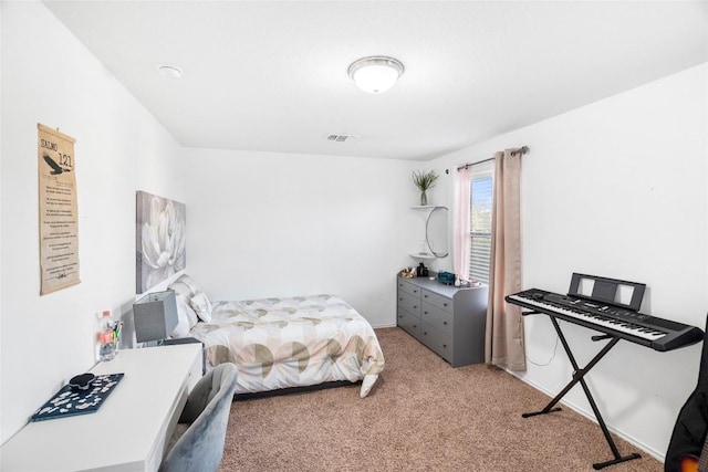 bedroom with light carpet and visible vents